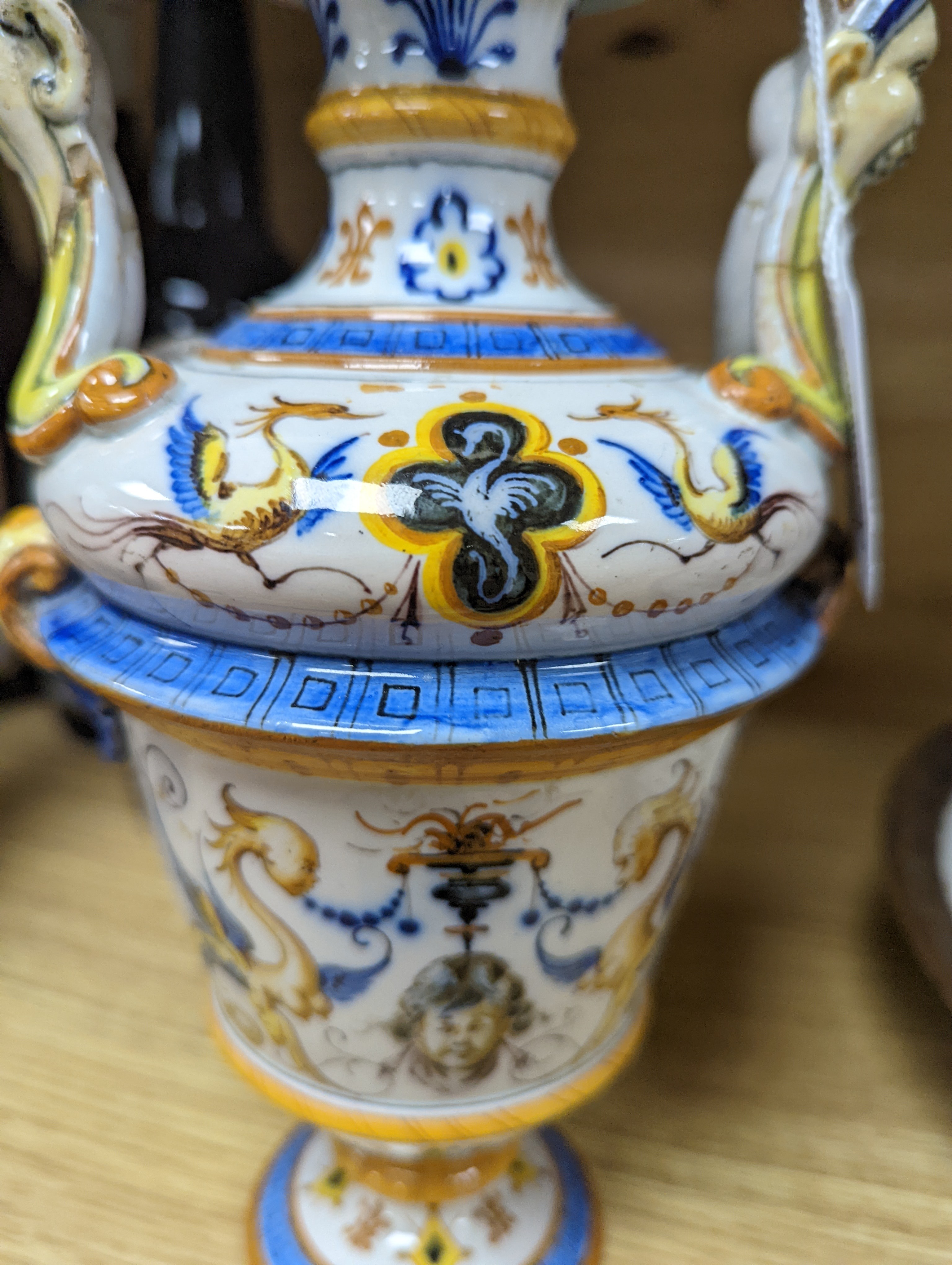 A Ginori maiolica two handled vase and Delft polychrome double cylinder teapot 27cm